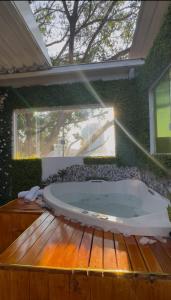 Getaway with Hot Tub and Retractable Roof in Campo Belo