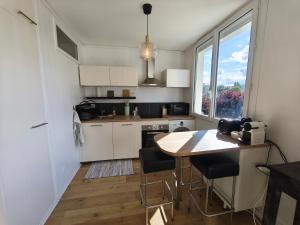 Appartement lumineux avec parking gratuit, accès Lyon rapide