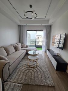 spacious furnished three bedroom apartment with swimming pool fully equipped gym ample parking space children playground area and amazing scenic views