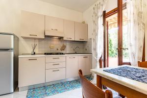 Bilocale Grecale family room