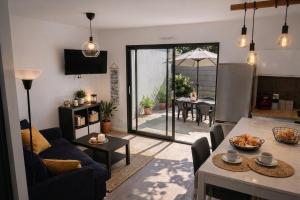 La plage à pied, T2 de 35 m2 avec cuisine, sdb et jardin privatif, parking, draps et serviettes inclus