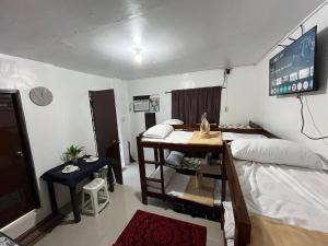 Budget Stay in Cebu Transient Room with WiFi, Netflix, AC & Free Parking Up to 8 Guests