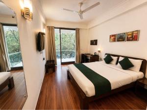 EMBLEM Hotel - Arjun Marg, Golf Course Road, Gurgaon