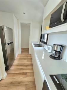 Urbano 1303 - 2 ambientes con cochera