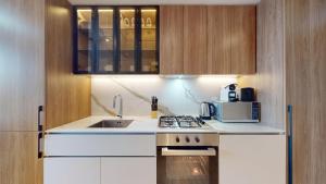 Vacationer Holiday Homes l Sophisticated Studio l Free Pool and Gym