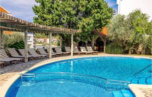 Stunning Apartment In Kampor With Swimming Pool