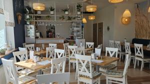 Domki, Apartamenty i Restauracja Włóczęga