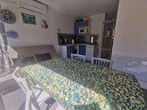 5041 CAP DAGDE Joli T3 parking piscine et climatisé en rez de jardin