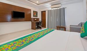 Treebo Premium Grand Legacy Elite with Roof Top Cafe