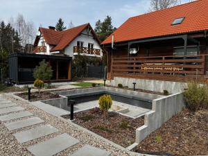 Checz Swornegacie - Dom wakacyjny nad jeziorem Karsińskim