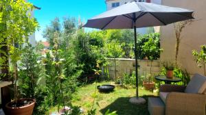 Dvosobni apartman cijela kuća za odmor s privatnim vrtom i terasom Rovinjsko Selo, Rovinj