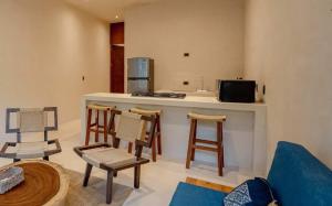 Stylish 1BR Retreat in Holistika with Private Pool