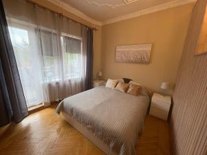 Apartamentai “Gėlių Alėja”