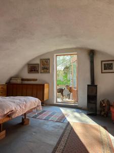 Cozy 100-year-old granary with a stove and goats