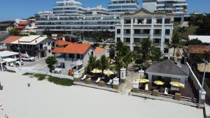 Golfinhos Apart hotel - Um Dormitório Frente ao Mar com Café de Manhã!