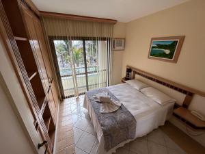 Golfinhos Apart hotel - Um Dormitório Frente ao Mar com Café de Manhã!