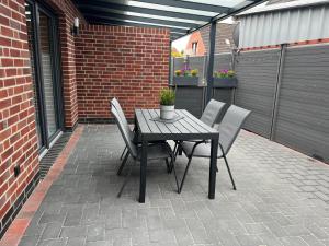 Barrierefreie Ferienwohnung Abendrot in Pewsum, 1 - 4 Personen