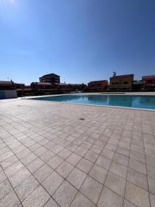Appartamento Le Spighe mare e piscina