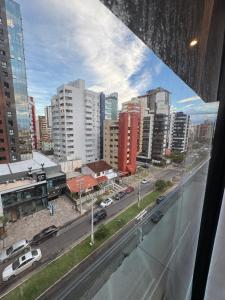 Apto praia de Torres, 3 suítes! Ótima localização!