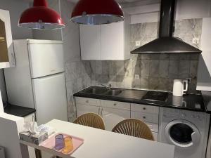 Cozy sunny entire apartment in the 16th arrondissement of Paris with a panoramic view of the Eiffel Tower just 3 minutes from the door Includes kitchen, bathroom, and living room