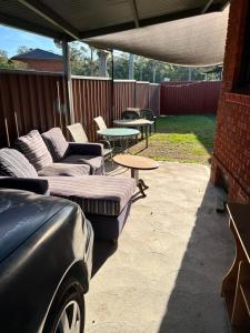 Fragrant Homes-68B independent aircon room, with 65’TV, queen size beds, rest sofa, built in wardrobe
