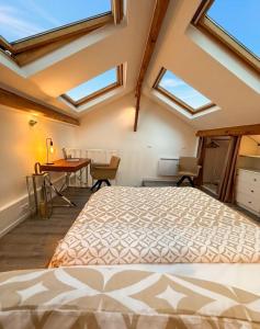 DUPLEX SUBLIME ET LUMINEUX au CENTRE VILLE 10 minutes de Paris Parking privée souterrain