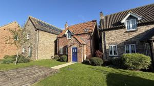 Wren Cottage - Part of the The Bay Filey Holiday Village with pool, gym and direct beach access, pub, restaurant, tennis and meadows walks