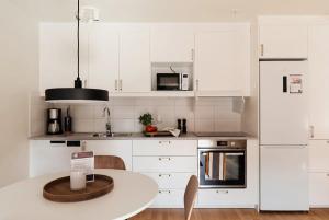 Guestly Homes - Central Premium Suite 1BR