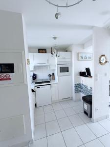 Maison avec jardin dans résidence fermée