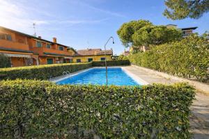 Villaggio Manuela Bilocale con giardino - Agenzia Cocal