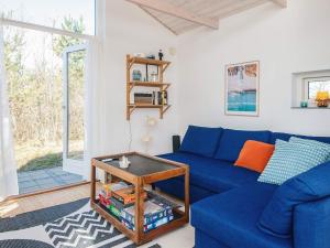 4 person holiday home in Grenaa