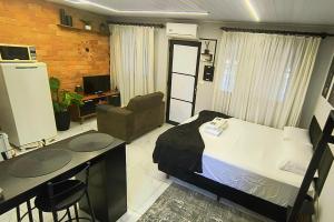 Loft moderno com ar-condicionado 1km da rodoviária