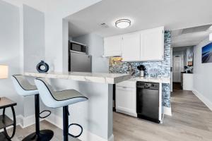 Beachfront Condo with Private Balcony at Meridian Plaza