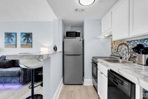 Beachfront Condo with Private Balcony at Meridian Plaza