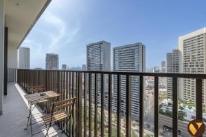 Vogue Vacation Homes, Luma Park Views JVC Near Circle Mall, Two Bedroom Apartment with Balcony, Park, City and Vibrant community View, Access toAmenities