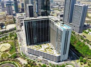 Vogue Vacation Homes, Luma Park Views JVC Near Circle Mall, Two Bedroom Apartment with Balcony, Park, City and Vibrant community View, Access toAmenities