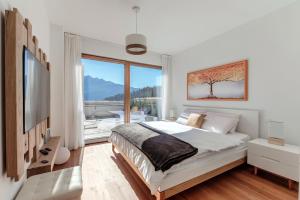Laax Alpine Lodge by Quokka 360 - Stylish Apartment with Terrace and Stunning Mountain Views
