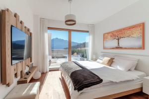 Laax Alpine Lodge by Quokka 360 - Stylish Apartment with Terrace and Stunning Mountain Views