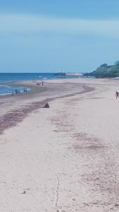 Cozy Coastal Getaway - Short walk to the beach