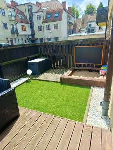 Apartament Rodzinny z ogródkiem w centrum Giżycka