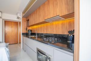 Apto Moderno c churrasq. em Jurerê IBI0401