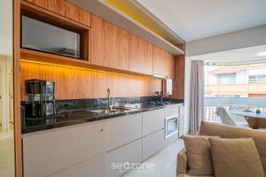 Apto Moderno c churrasq. em Jurerê IBI0401