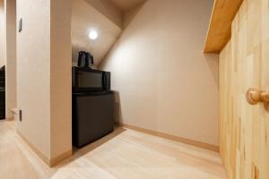 Akariya 4-minute walk from the nearest station, direct line to downtown and USJ, 2 bedrooms, maximum 4 guests