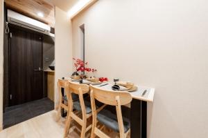 Akariya 4-minute walk from the nearest station, direct line to downtown and USJ, 2 bedrooms, maximum 4 guests
