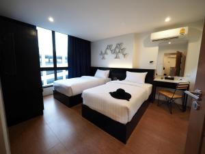 Phòng Hai Giường Đơn Loại Sang (Deluxe Twin Room)