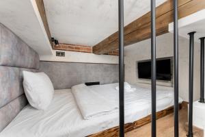 Bohaterów Getta Studio with Mezzanine by BookingHost