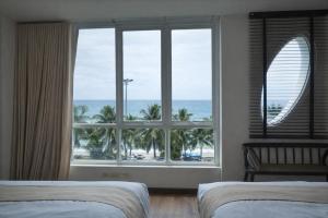 Beachfront 70 sqm Premier Sea View and Pool View Family Room FREE DISNEY PLUS