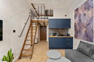 Bohaterów Getta Studio with Mezzanine by BookingHost