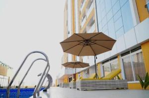 1 bhk luxury apartment at Spectrum Mall with Swimming Pool - Ghumloo