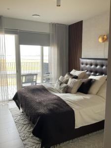 Stylish 2BR Apt Near Reykjavik with Balcony & Views